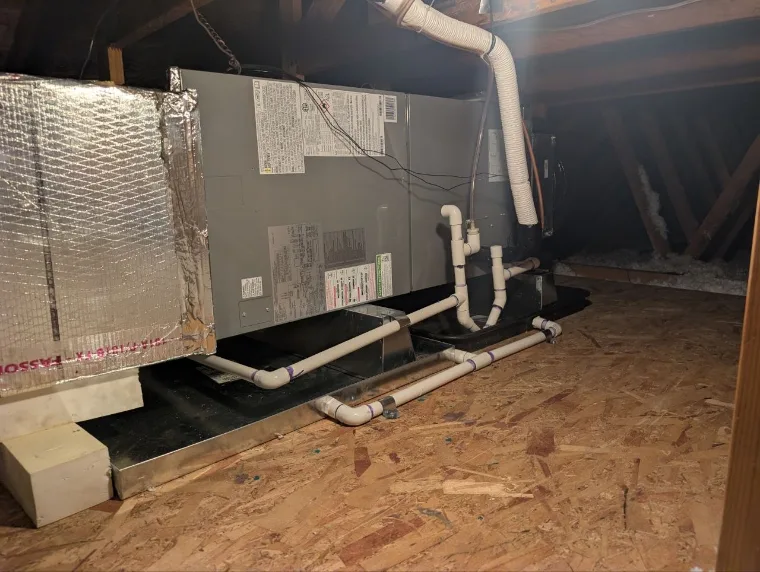 Air handler Sunny installed in an attic, drain pan and condensate lines run off it
